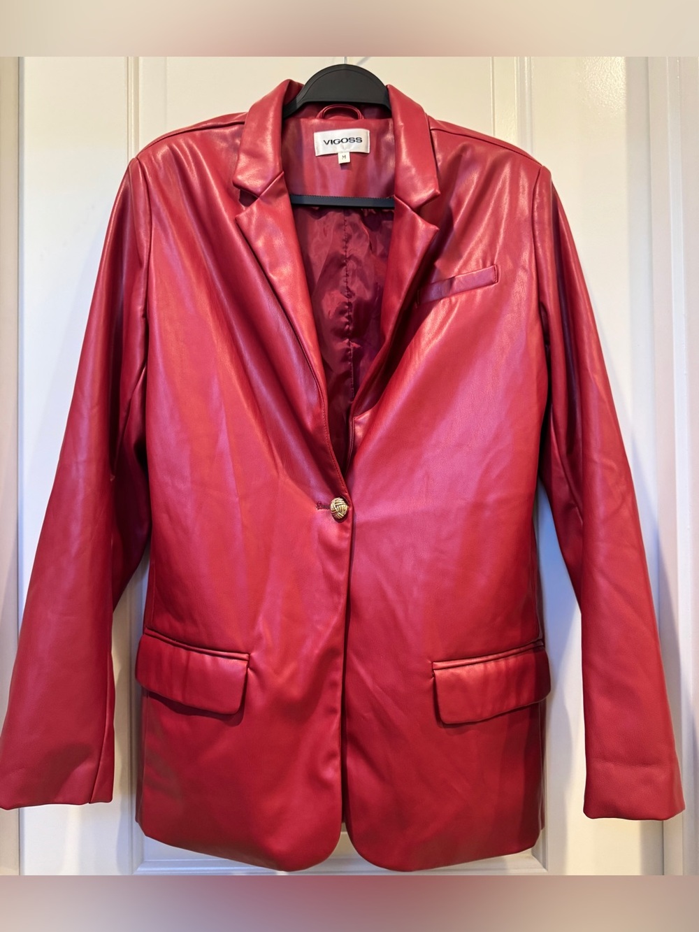 Woman’s red Vigoss faux-leather blazer size M